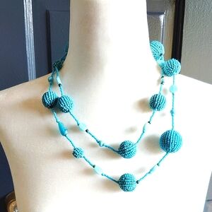 Long Turquoise-colored Vintage Beaded Necklace